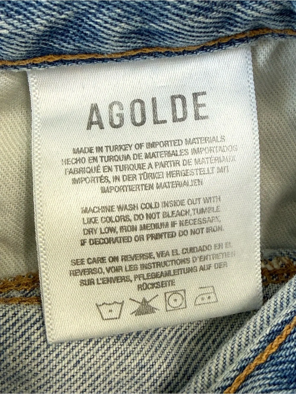 AGOLDE CRISS CROSS FRAYED HEM BLUE JEAN SHORTS - Picture 6 of 9